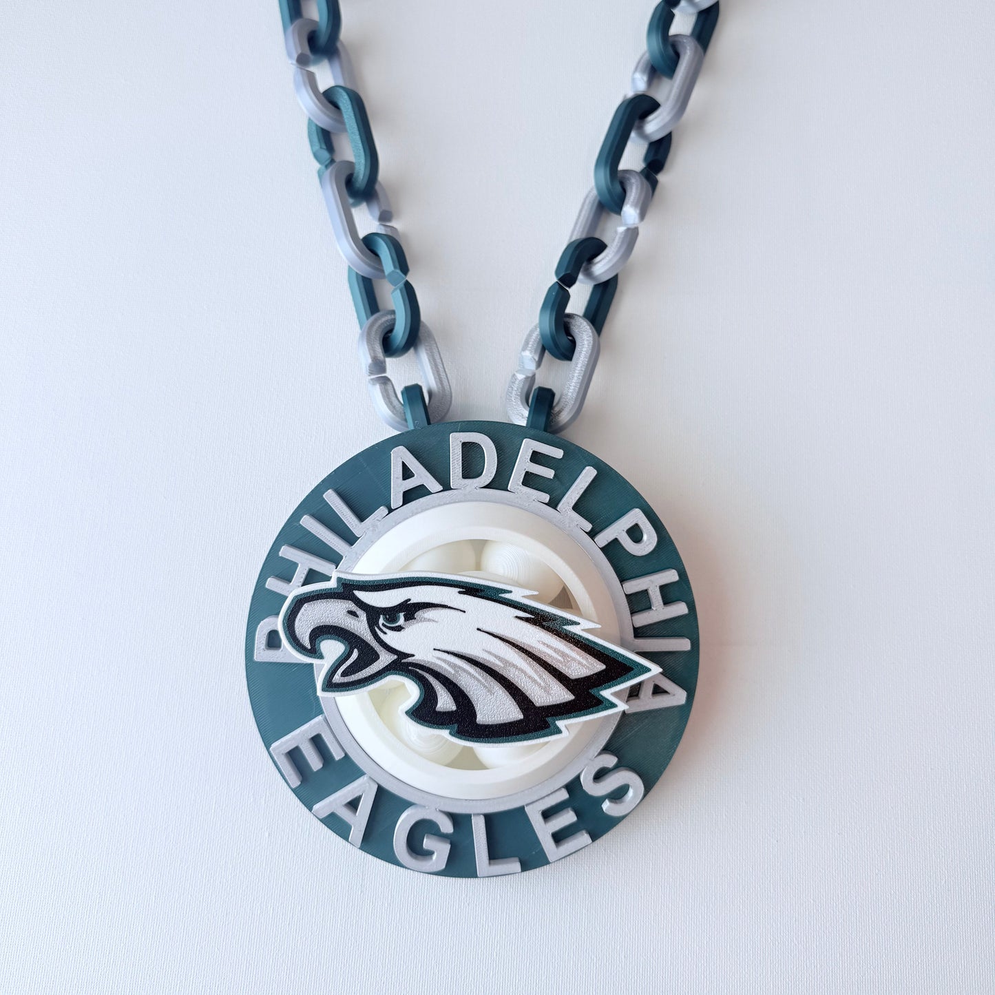 Philadelphia Eagles keychain with chain on a white background