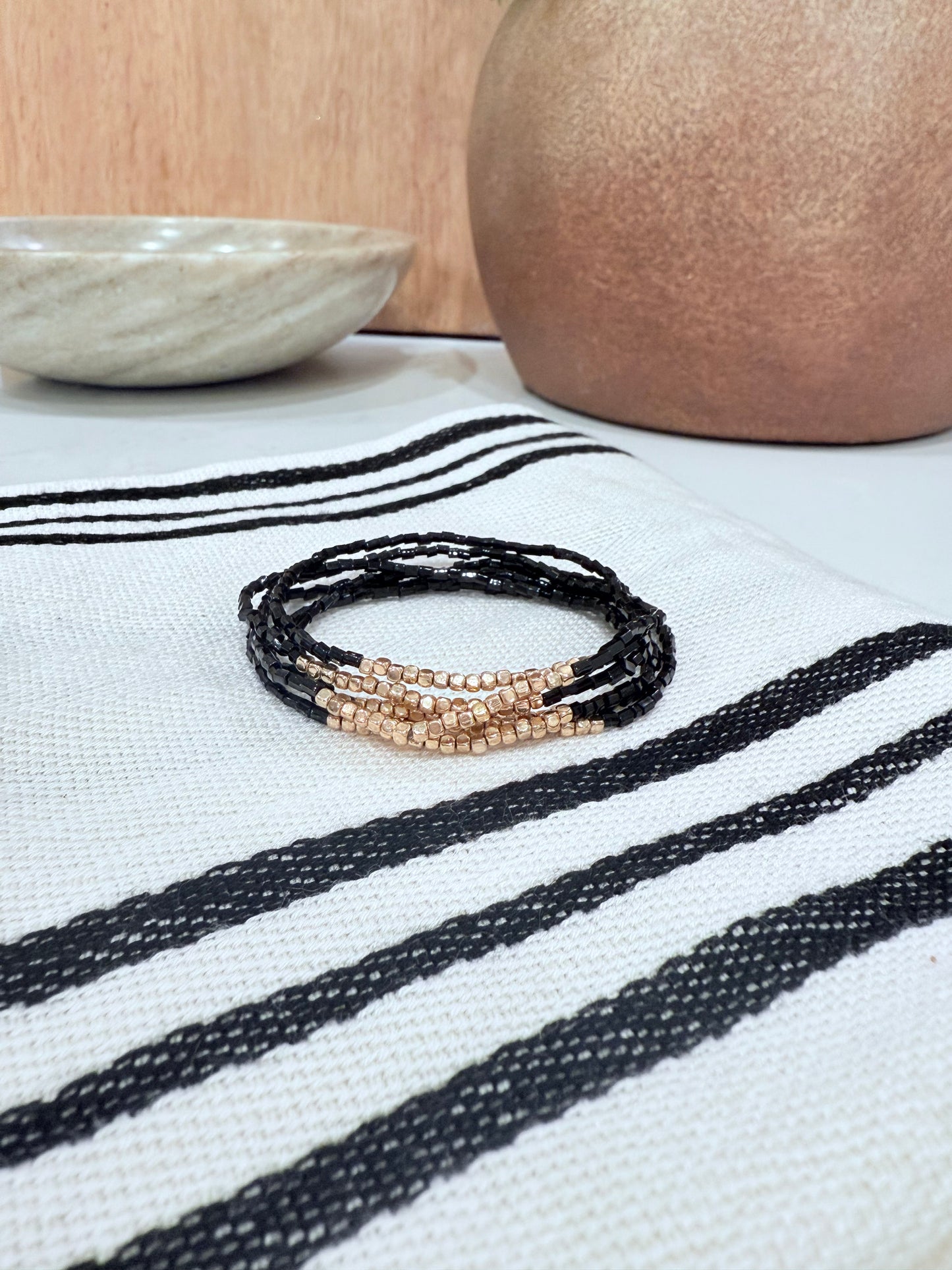 Gold and Black Beaded Bracelets