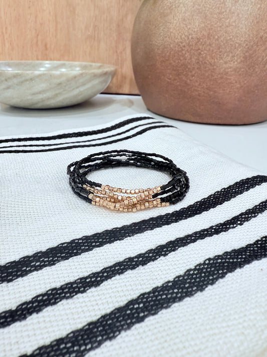Gold and Black Beaded Bracelets