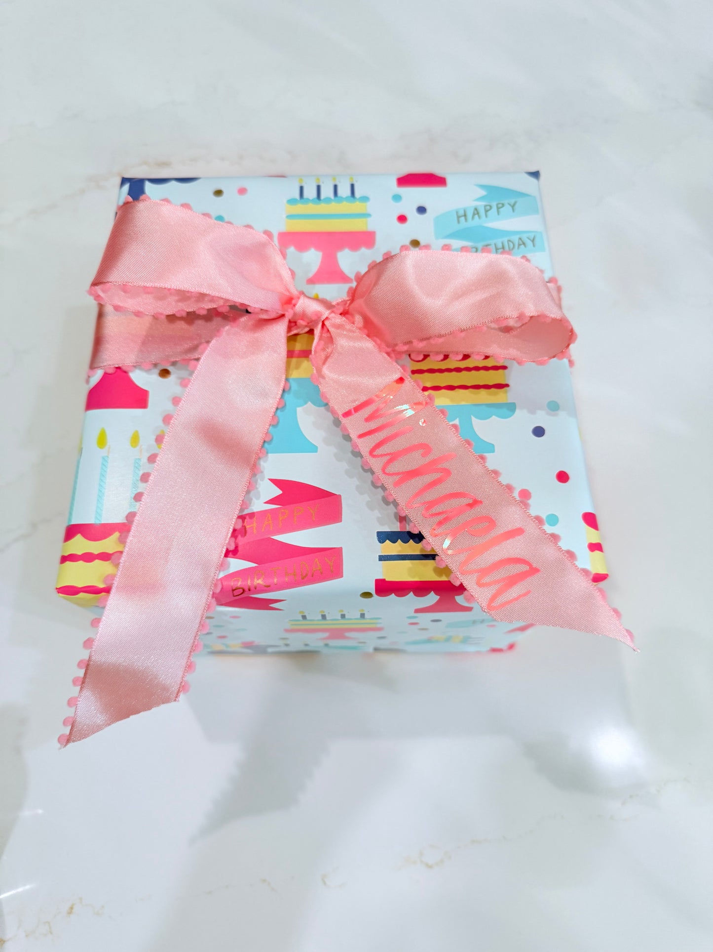 Gift Wrapping with Personalize name on Ribbon