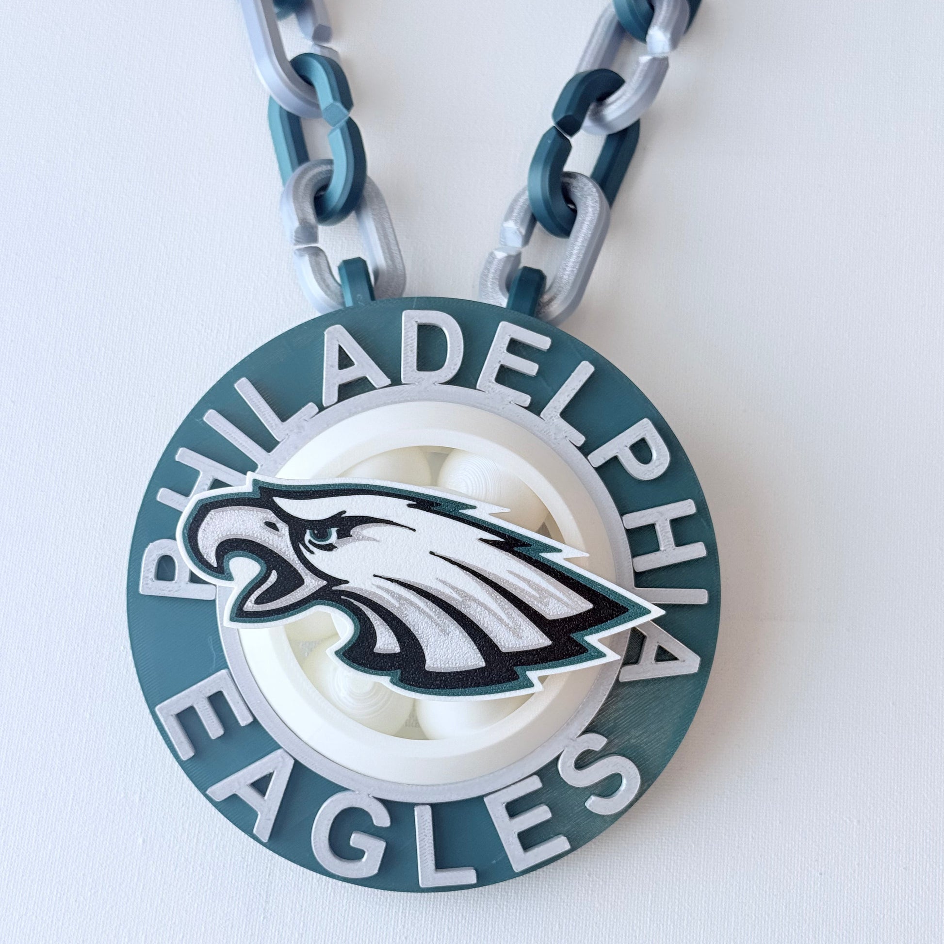 Philadelphia Eagles keychain with chain on a white background