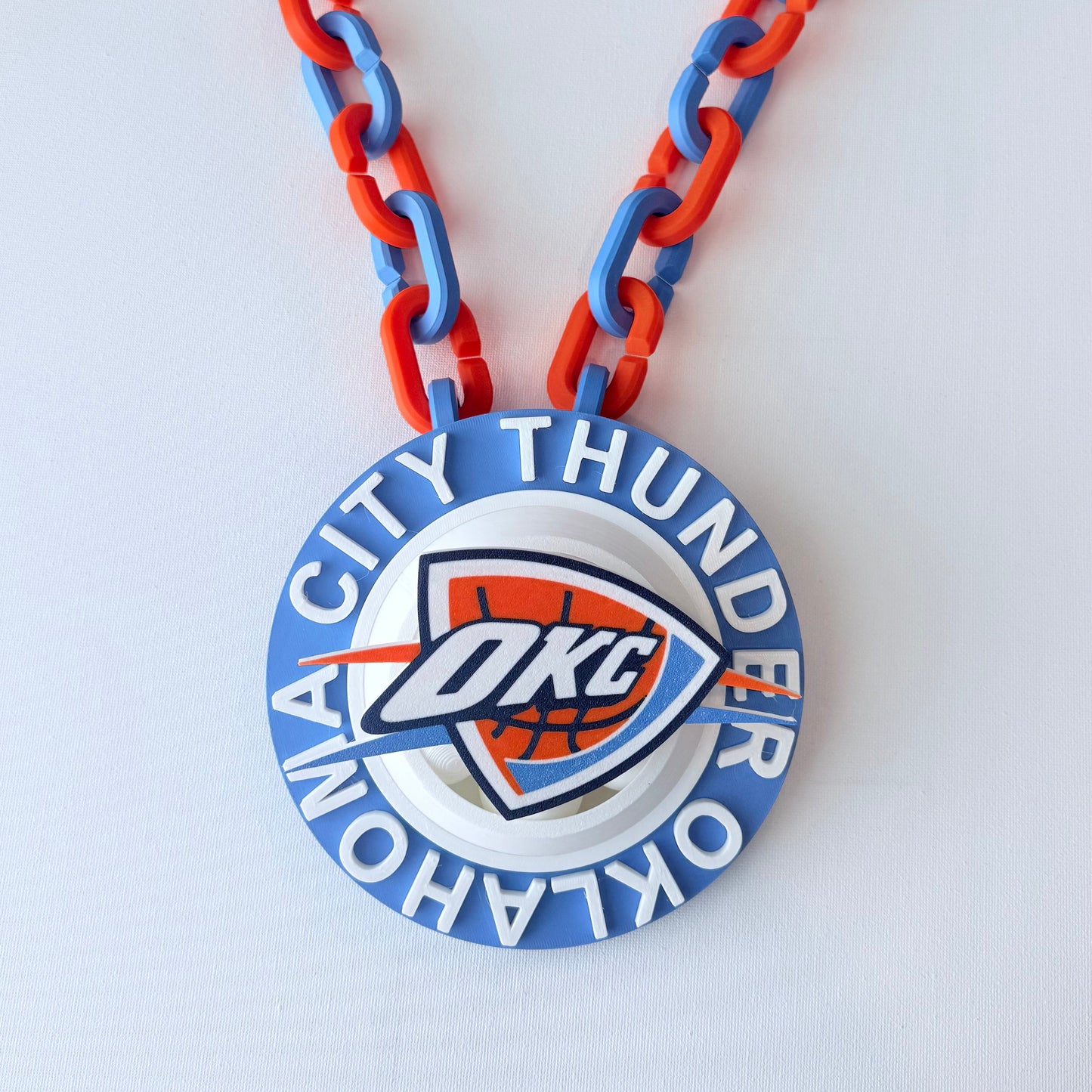 Necklace with Oklahoma City Thunder pendant on a white background