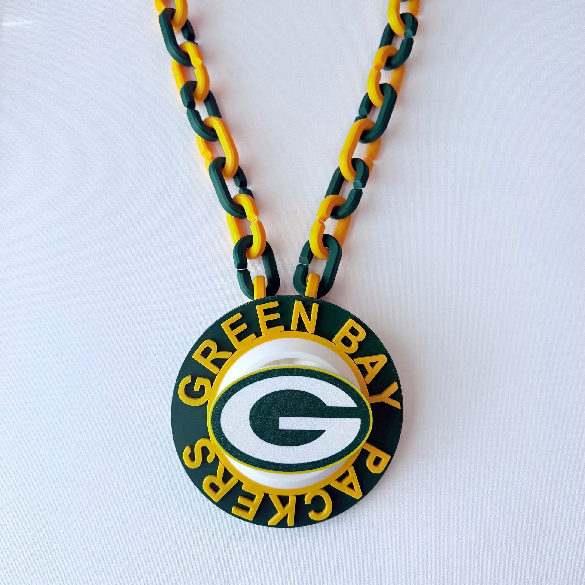 Necklace with Green Bay Packers pendant on a white background