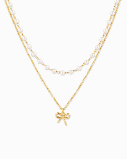 Double Layered Pearl Chain and Bow Pendant Necklace